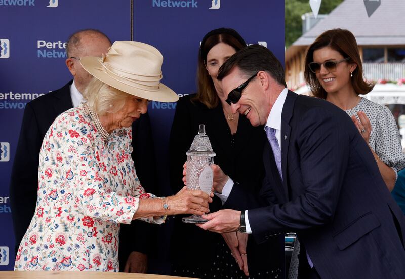 Aidan O'Brien receives the trophy after winning the Pertemps Yorkshire Oaks with Minnie Hauk on Thursday. Photograph: Richard Sellers/PA