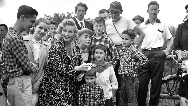 Zsa Zsa Gabor signs autographs for fans in 1952. Photograph: Meyer Liebowitz/The New York Times