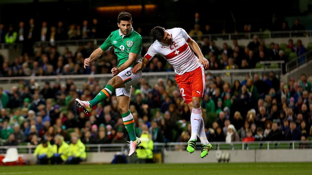 Ireland’s Shane Long climbs above Switzerland’s Fabian Schar before seeing his header come back of the post at the Aviva Stadium. Photograph: Donall Farmer/Inpho