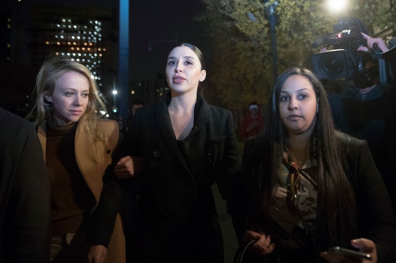 Emma Coronel (center) the wife of Joaquin “El Chapo” Guzman leaves Brooklyn Federal court after opening arguments in the trial of El Chapo Photograph: Mary Altaffer/AP