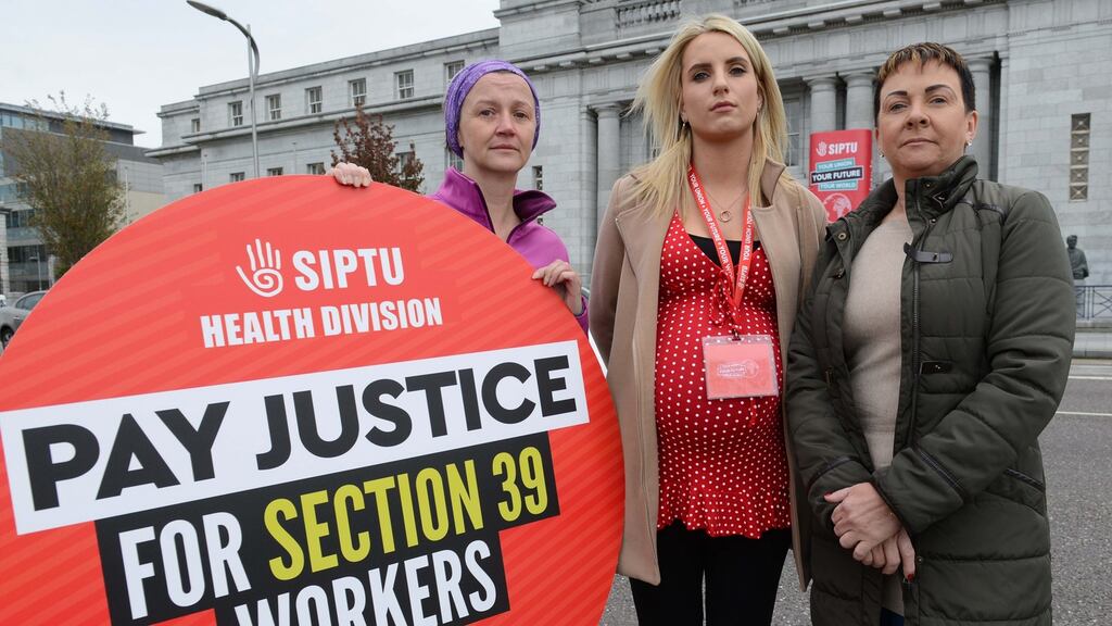 Siptu members Jaqueline Kirby, Liz Cloherty and Helen Power launching the union’s pay campaign for workers in Section 39 organisations. Photograph: Jimmy Weldon