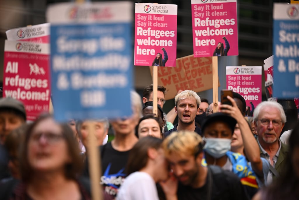People protest against the UK's deportation flights to Rwanda outside the Home Office in London on Tuesday. Photograph: Leon Neal/Getty