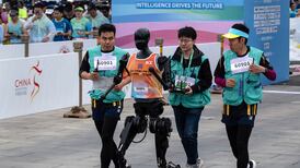 China pits humanoid robots against humans in half-marathon race in Beijing