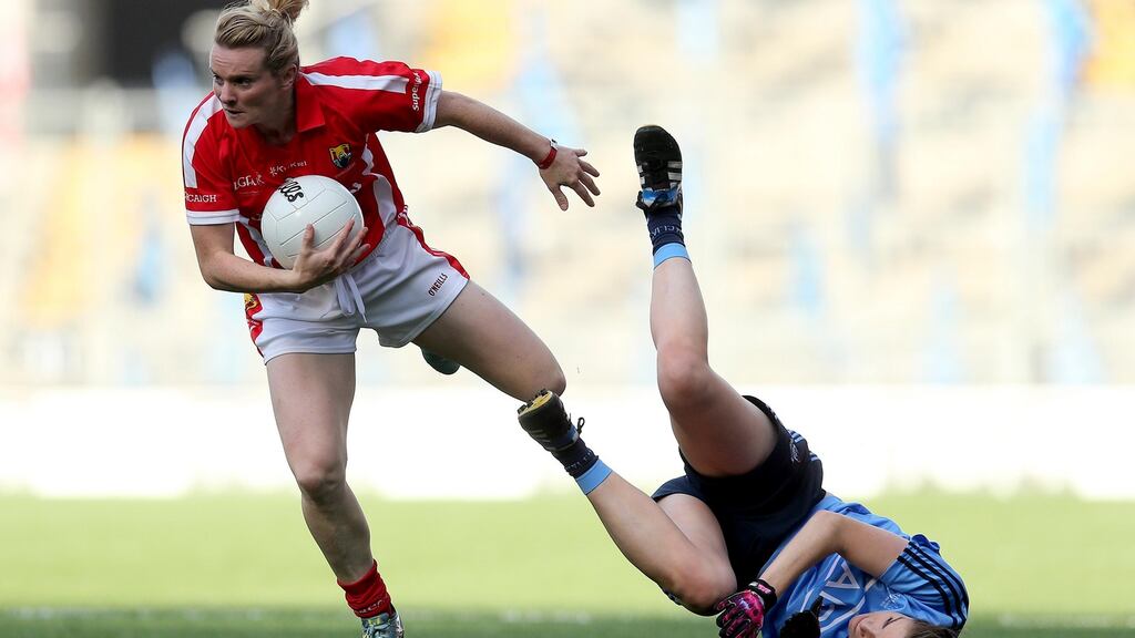 Cork’s Briege Corkery leaves Dublin’s Sinead Finnegan in her wake during the TG4 All-Ireland ladies senior football final in Croke Park. Photo: Ryan Byrne/INPHO
