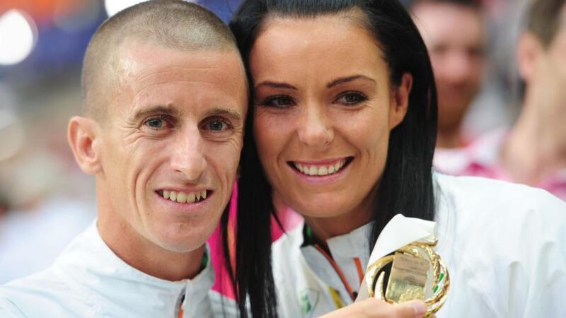 Rob Heffernan with his wife Marian and his gold medalat the Luzhniki Stadium in Moscow. Photograph: Adam Davy/PA Wire.