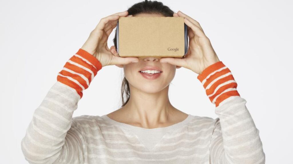 Students peer into a headset made of cardboard (an inserted smartphone acts as the lens) and absorb three-dimensional 360-degree panoramas