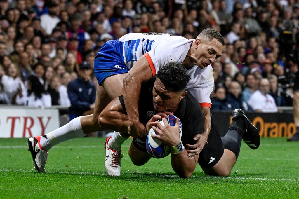 Caleb Clarke of New Zealand scores a try during the Rugby World Cup Pool A game against Namibia at Stadium de Toulouse. Photograph: Andrew Cornaga/Inpho/Photosport