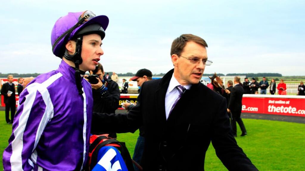 Trainer Aidan O’Brien with his son, jockey Joseph O’Brien, who will team up with Belisarius at Navan today. Photo: Brian Lawless/PA Wire.