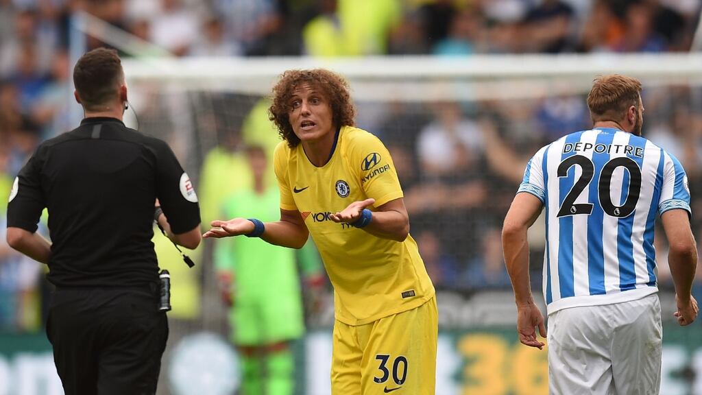 Chelsea’s Brazilian defender David Luiz protests to the referee in the match against Huddersfield Town. Photograph: Oli Scarff/AFP/Getty Images