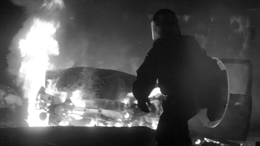 An RUC police officer in riot gear during rioting by loyalists in Belfast. The Irish government said the RUC must not be allowed to “descend to the level and methods of the terrorists”. Photograph: Paul McErlane/Reuters