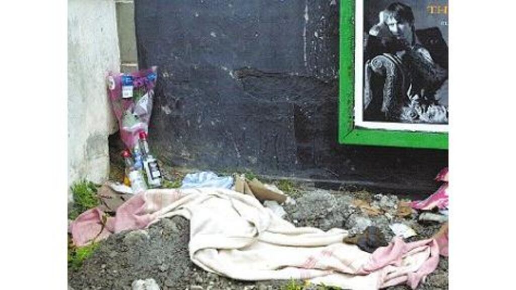 Flowers mark the scene on Prussia Street in Dublin, yesterday, where a homeless man died.