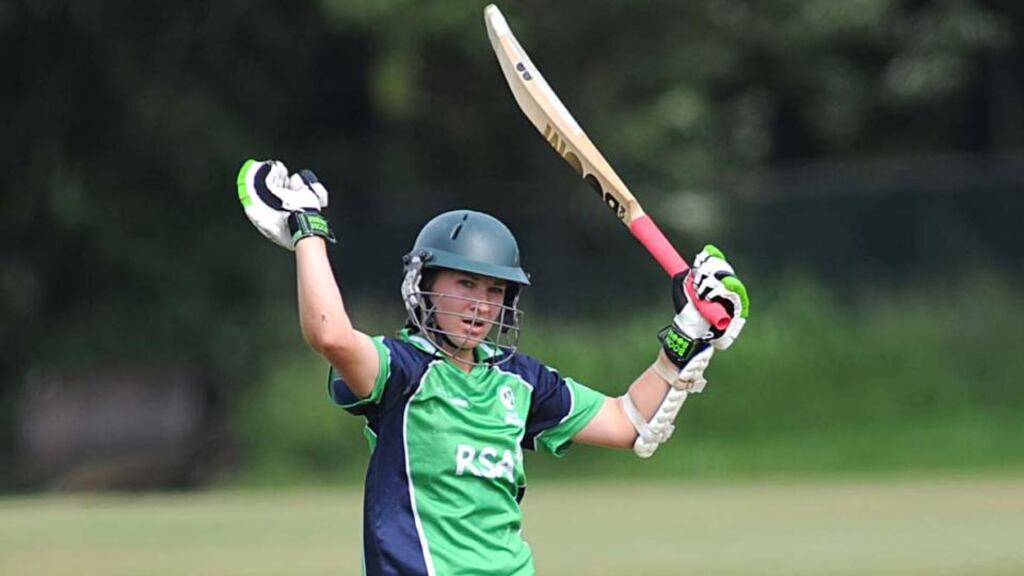 Clare Shillington raises her bat after scoring a century against Japan during the ICC Women’s World Twenty20 global qualifier match at Milverton in Skerries. Photograph: Ian Jacobs/ICC