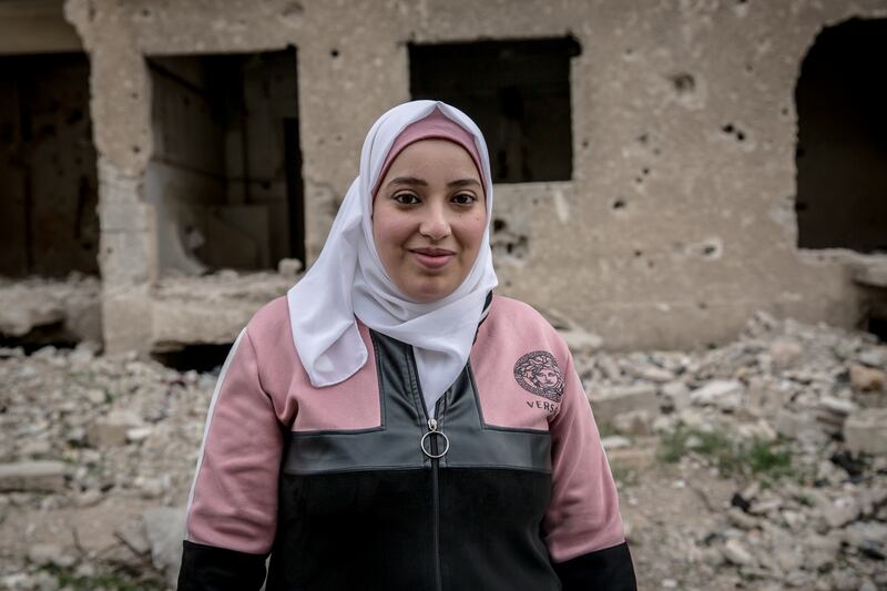 Alaa’ Chahade (34) has moved back into the largely destroyed Yarmouk Camp in Damascus. Photograph: Sally Hayden