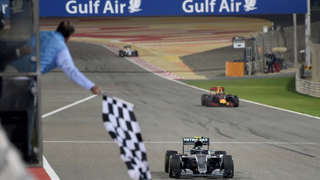 Mercedes driver Nico Rosberg of Germany crosses the finish line to win the Bahrain Formula One Grand Prix, at the Formula One Bahrain International Circuit, in Sakhir, Bahrain. Photo: Andrej Isacovic/Pool via AP