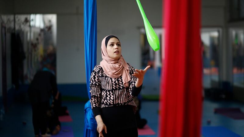 The women of Gaza get their circus skills on. Photograph: Mohammed Al Baba