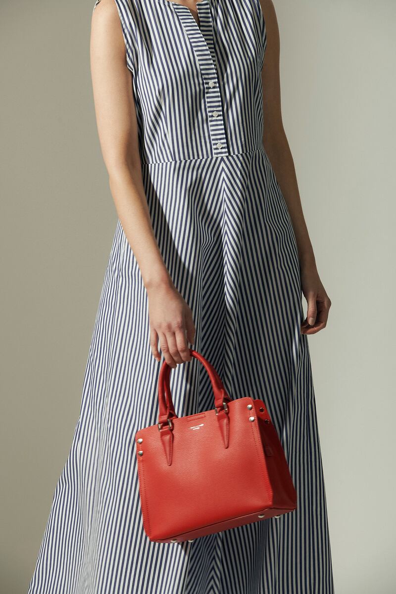 Striped dress €163 by Emma Marella, red bag €44.95 at Meadows + Byrne