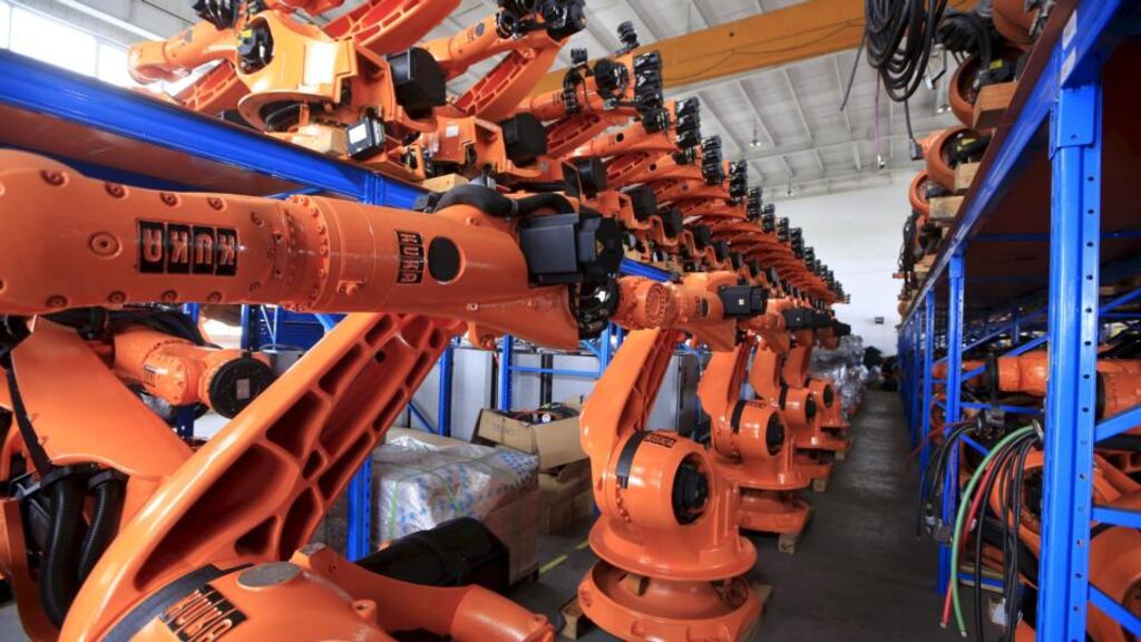 Robots are seen in a factory in Shanghai. Activity in China’s factory sector unexpectedly shrank to a 6-1/2 year low in September, raising fears of a sharper slowdown in the world’s second-largest economy that could spell more turmoil for financial markets. Photograph: Aly Song/Files/Reuters