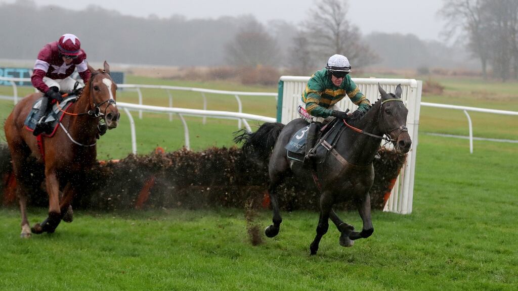 Buveur D’Air and  Barry Geraghty pull clear of Samcro and Jack Kennedy to win the Fighting Fifth Hurdle at Necastle. Photograph: Richard Sellers/PA