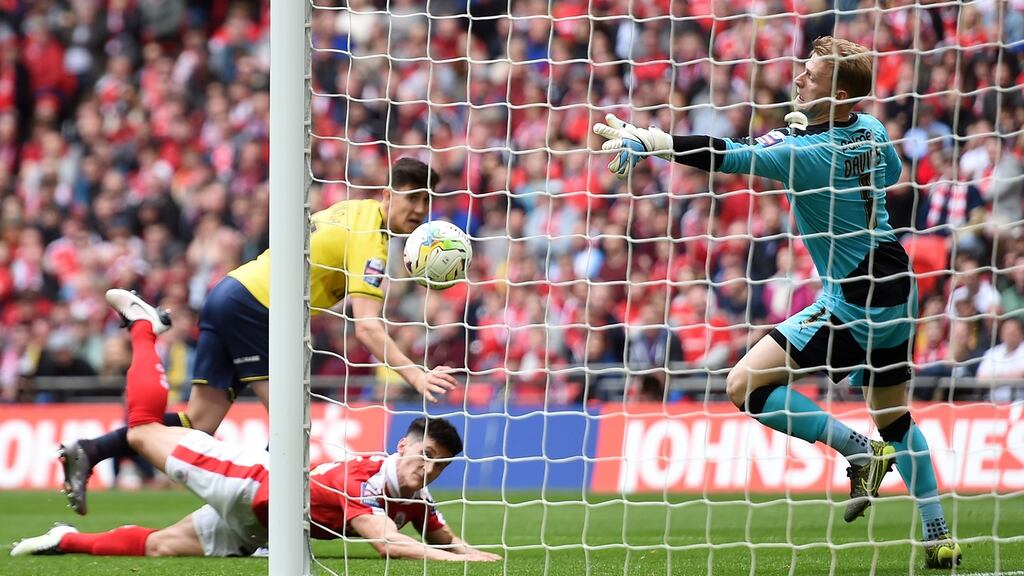 Callum O’Dowda of Oxford United scores during the Johnstone’s Paint Trophy Final match against Barnsley at Wembley Stadium. Photograph: Tom Dulat/Getty Images
