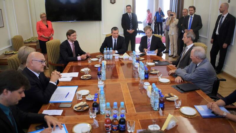 German finance minister Wolfgang Schaeuble (right) speaks with his counterparts Mateusz Szczurek of Poland and Michel Sapin (left) of France during a meeting in Warsaw. Photograph: Jacek Marczewski/Agencja Gazeta/REUTERS.