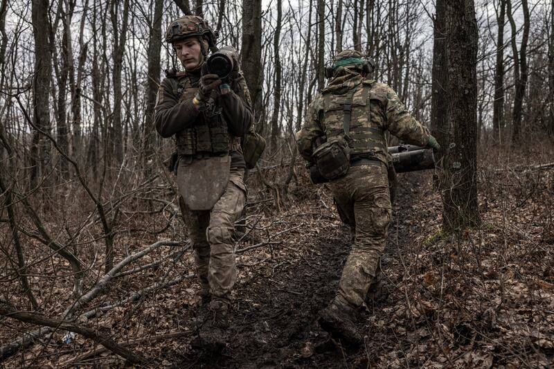 Members of a Ukrainian artillery crew move shells on the frontline in the Donetsk region of Ukraine on December 28th last. Photograph: Finbarr O’Reilly/New York Times