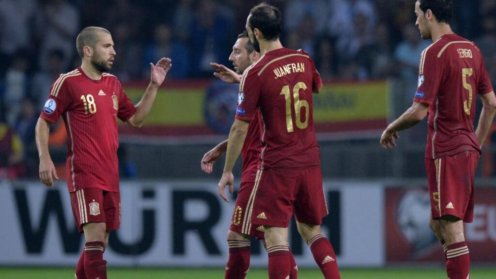 Spain’s players celebrate after winning the Euro 2016 group C qualifying football match between Belarus and Spain in Borisov. Photo: Getty Images