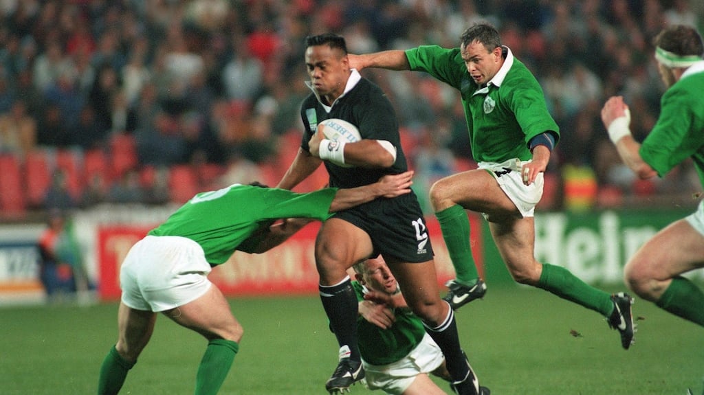 Jonah Lomu runs through the Ireland defence at Ellis Park in Johannesburg during the 1995 Rugby World Cup. Photograph: Billy Stickland/Inpho