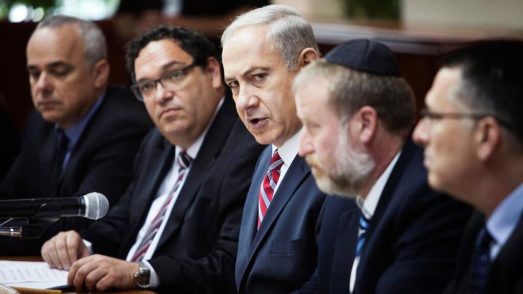 Israeli prime minister Binyamin Netanyahu (centre) attending a weekly cabinet meeting in Jerusalem yesterday. Mr Netanyahu said yesterday chemical weapons use in Syria could not be tolerated. Photograph: Dan Balilty/Reuters