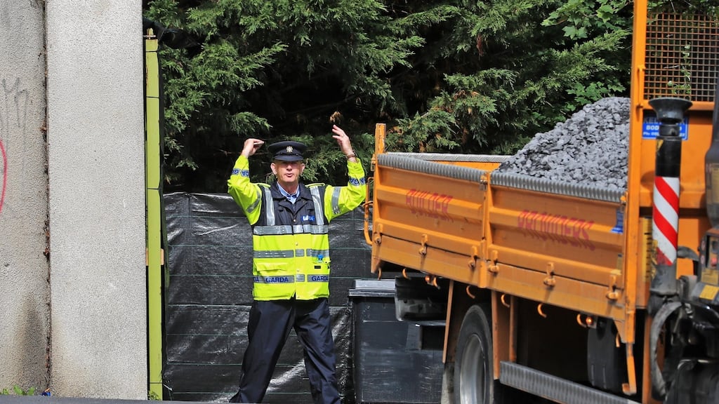 A truck carrying gravel arrives at the scene of the search for the body of Trevor Deely in Chapelizod, Co Dublin. Photograph: Colin Keegan/Collins Dublin
