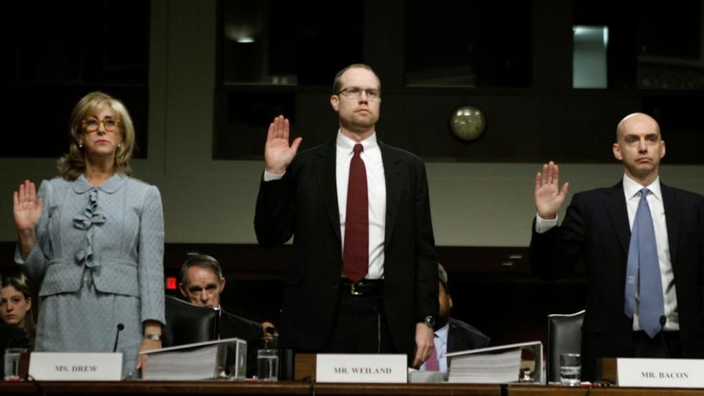 (L-R) Ina Drew, former Chief Investment Officer of JP Morgan Chase Bank, Peter Weiland, former Head of Market Risk Chief Investment Office of JP Morgan Chase, and Ashley Bacon, Acting Chief Risk Officer of JP Morgan Chase, swear in before testifying before the Senate Homeland Security Investigations Subcommittee in Washington March 15, 2013. The committee is investigating JPMorgan Chase Whale Trades. REUTERS/Gary Cameron    (UNITED STATES - Tags: POLITICS BUSINESS)