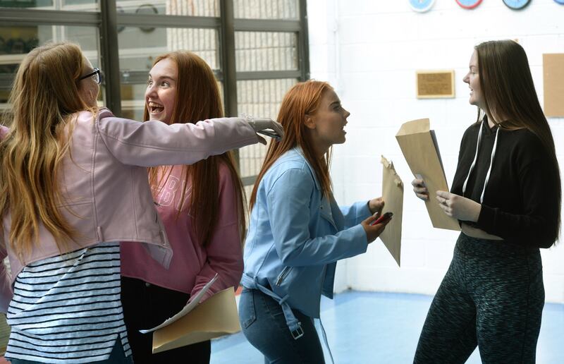SHOUT IT OUT: Chloe Nesbitt (left), Rachel Manley, Emma Keogh and Jennifer Burke get their Leaving Cert results at Pobalscoil Neasáin, Baldoyle, Dublin. Photograph: Dara Mac Dónaill/The Irish Times