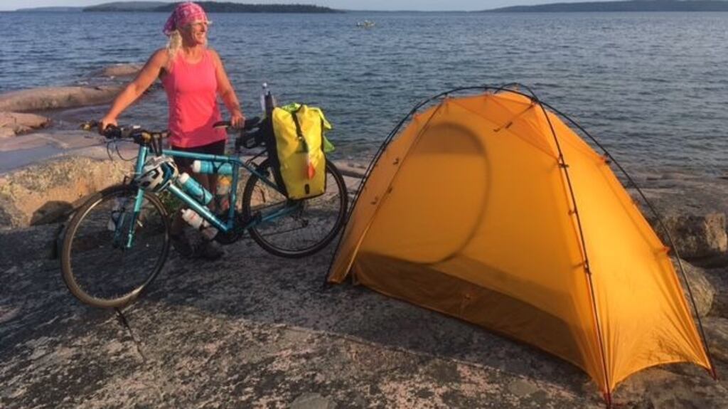 Karen Weeks taking in the sights at Lake Victoria on her solo cycling trip across Canada.