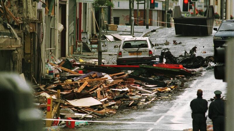 RUC officers survey the aftermath of the Omagh bombing. Photograph: Frank Miller