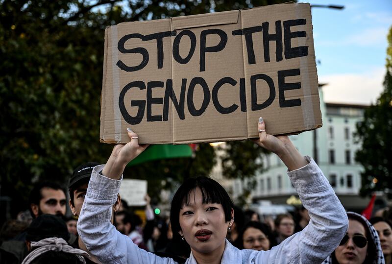An activist holds a placard during a demonstration in solidarity with Palestinians in Berlin on Saturday. Photograph: Filip Singer/EPA-EFE