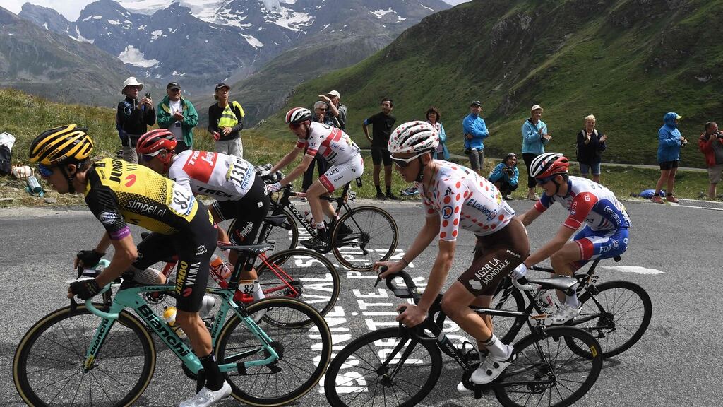 Dan Martin (centre)  in action during stage 19 of the Tour de France  between Saint-Jean-de-Maurienne and Tignes. Photograph: Jeff Pachoud/AFP/Getty Images