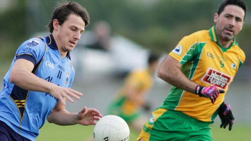 Sean Armstrong of Salthill Knocknacarra and Kieran Comer of Corofin. Photograph: Mike Shaughnessy/Inpho