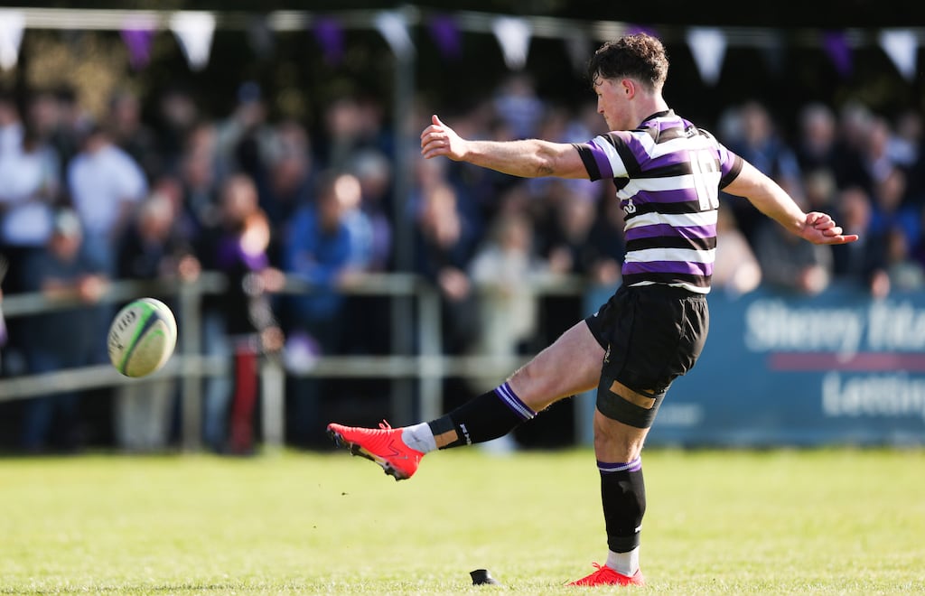 Terenure's Aran Egan kicks a conversion. Photograph: Tom Maher/Inpho