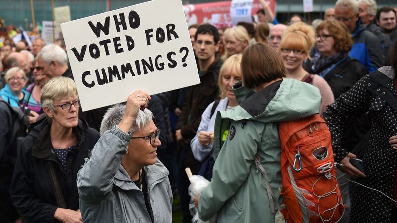 A demonstrator holds up a placard at a protest n Manchester against the move to suspend parliament in the final weeks before Brexit. Photograph: Getty