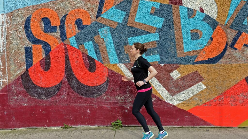 Mary Jennings limbers up around Grand Canal Dock. Photograph: Eric Luke/The Irish Times