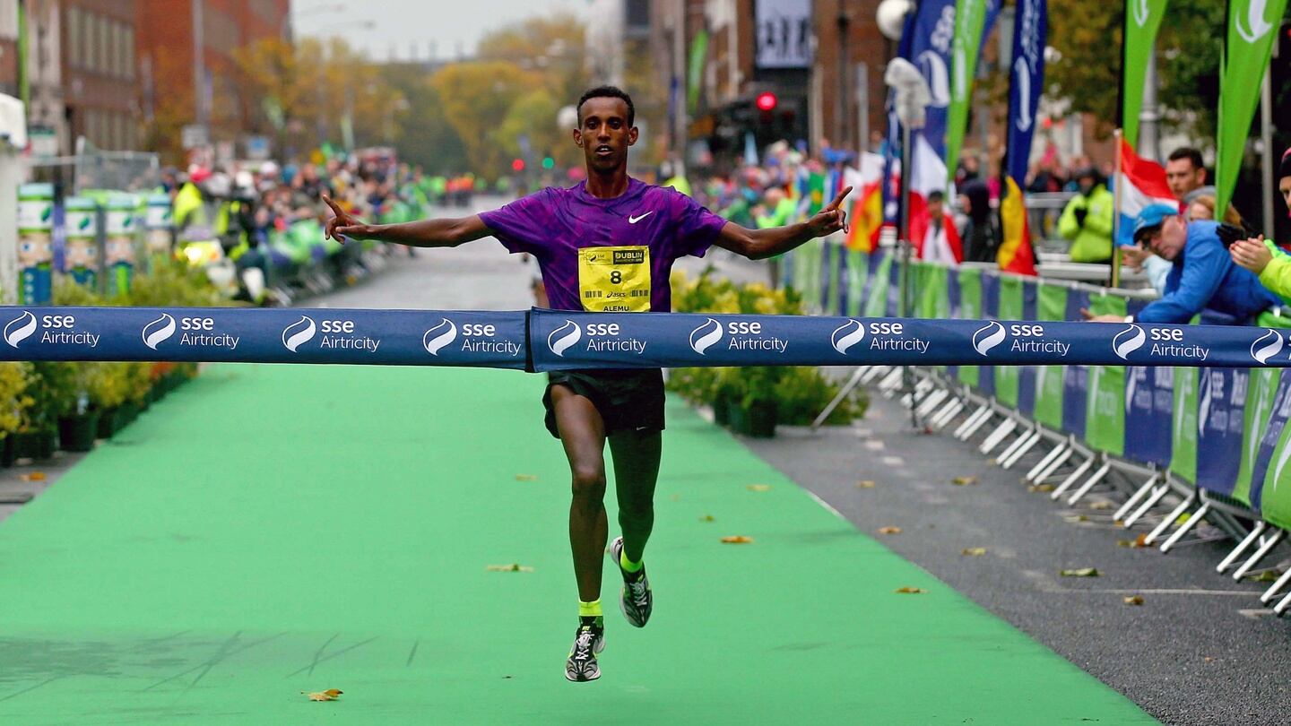 Ethiopia’s Alemu Gemechu crosses the line to win the 2015 SSE Airtricity Dublin Marathon. Photograph: Donall Farmer/Inpho