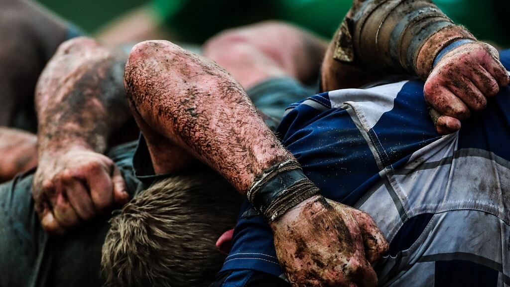 Action from the Galwegians versus Dungannon Division 2B clash at Crowley Park. Difficult playing conditions prevailed nationwide over the weekend. Photograph: James Crombie/Inpho
