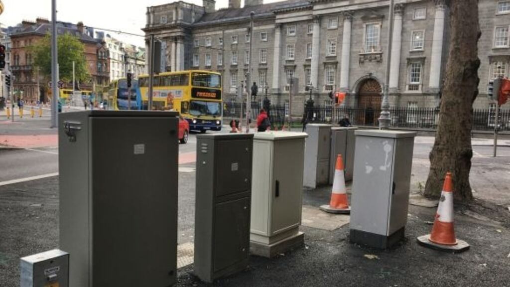 Bad design: metal boxes located on College Green, Dublin to service the new Luas Cross City line. Photograph: Bryan O’Brien