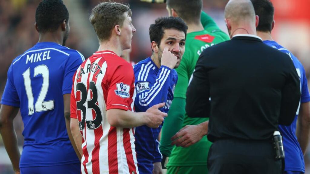Cesc Fabregas of Chelsea questions a decision from referee Anthony Taylor during the Premier League match against Southampton at St Mary’s. Photograph: Michael Steele/Getty Images