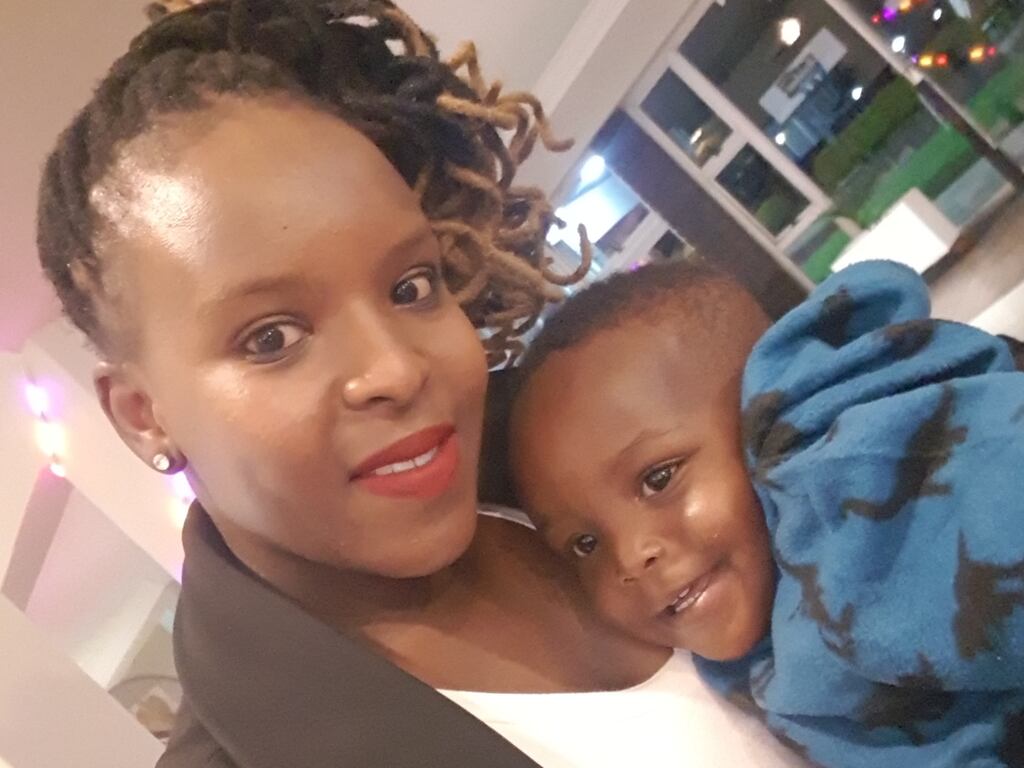 Healthcare assistant Vimbainashe Chingono from Zimbabwe, pictured with her son Kyrill, is questioning her decision to remain in Ireland if her family cannot join her