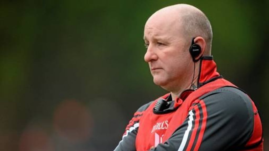 Colin Kelly feels two points from Louth’s remaining three games would see them promoted to Division Two. Photo: Inpho