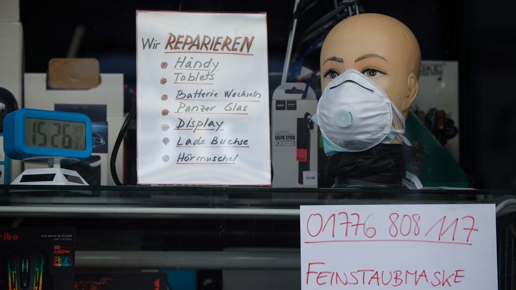 FFP2 face masks advertised at a closed shop in Berlin. The Netherlands found flaws in a shipment from China that prevented the masks acting as effective barriers against coronavirus. Photograph: David Gannon/AFP via Getty Images