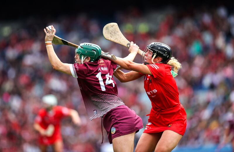 Galway's Niamh Mallon and Laura Hayes of Cork. Photograph: Bryan Keane/Inpho