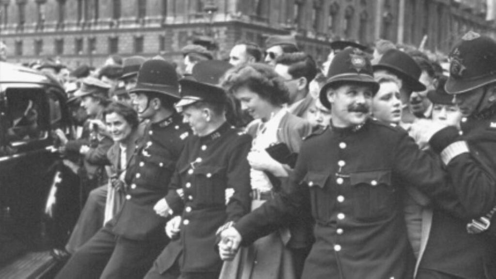 London bobbies struggle to hold back surging crowd of Londoners massed in Parliament Square on VE Day, signalling end to WWII in Europe. Photograph: Getty Images/Bob Landry