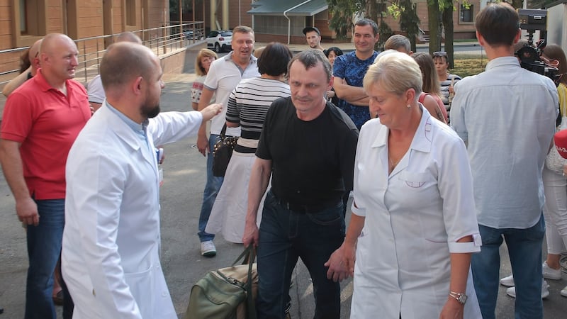 Medical workers assist a freed Ukrainian prisoner who arrived from Boryspil International Airport, in Feofania hospital in Kiev, Ukraine, as part of the bilateral prisoner swap. Photograph: EPA
