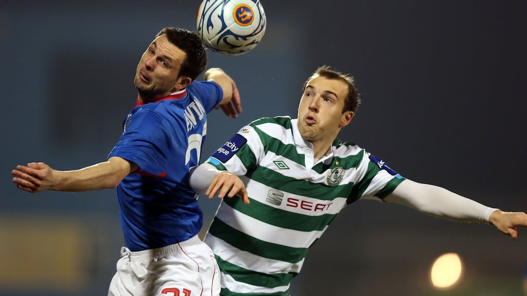 Shamrock Rovers’ Karl Sheppard challenges Jim Ervin of Linfield during the 2013 Setanta Cup. Photo: Donall Farmer/Inpho